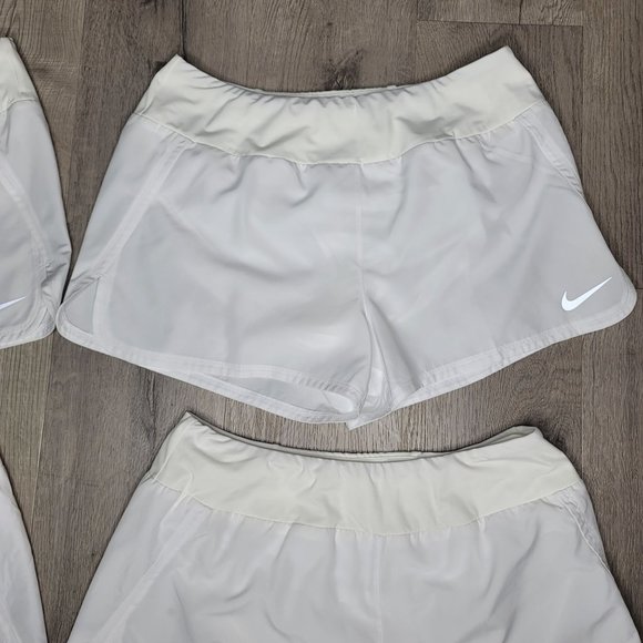 Nike dri fit white running shorts set of 4. pocket on back with lining size Larg - Picture 12 of 13